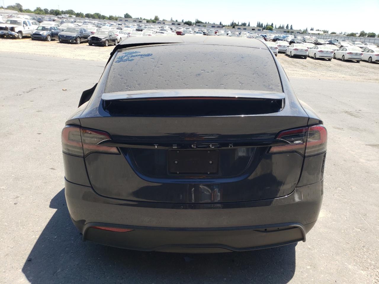 2024 Tesla Model X VIN: 7SAXCBE53RF457201 Lot: 63325675