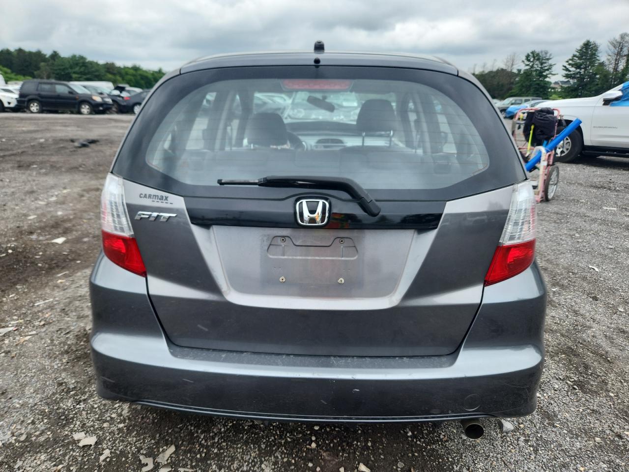 2013 Honda Fit VIN: JHMGE8H35DC027677 Lot: 64938385