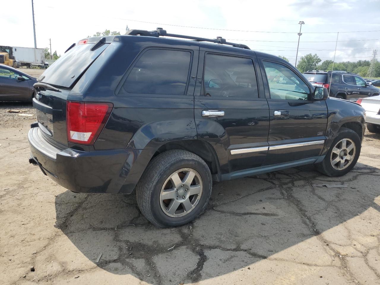 2009 Jeep Grand Cherokee Laredo black null gas 1J8GR48KX9C555446 photo #4