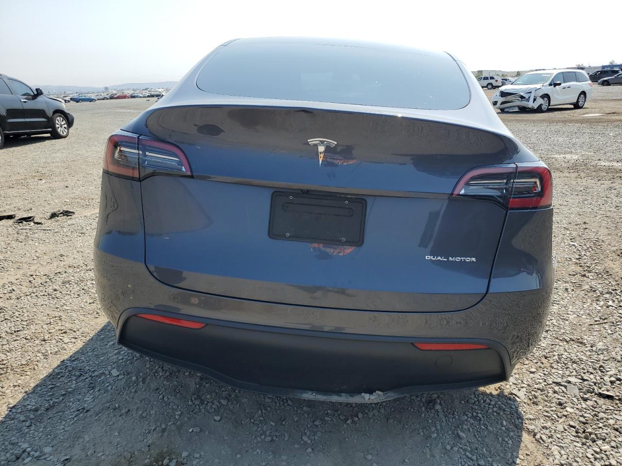 2023 Tesla Model Y VIN: 7SAYGAEE1PF772109 Lot: 64802185