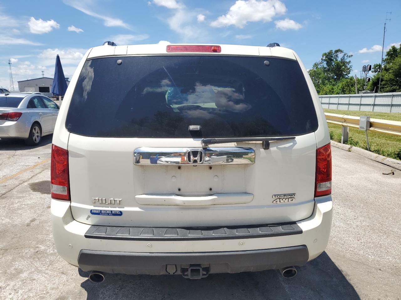 2011 Honda Pilot Touring VIN: 5FNYF4H92BB037129 Lot: 61978905