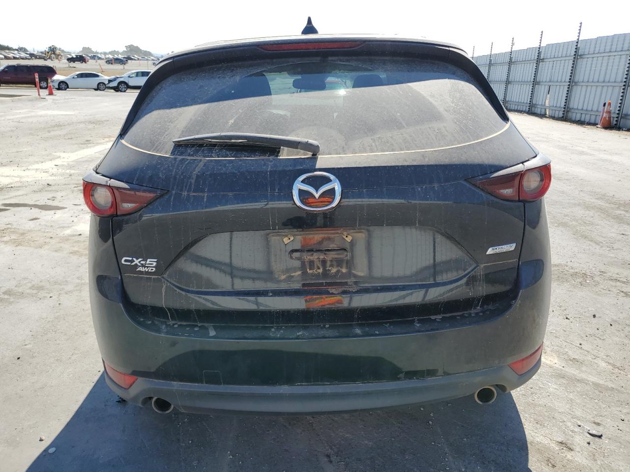 2017 Mazda Cx-5 Touring VIN: JM3KFBCLXH0100585 Lot: 64457715