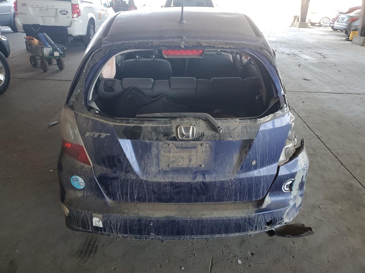 2009 Honda Fit VIN: JHMGE872X9S036722 Lot: 64701315