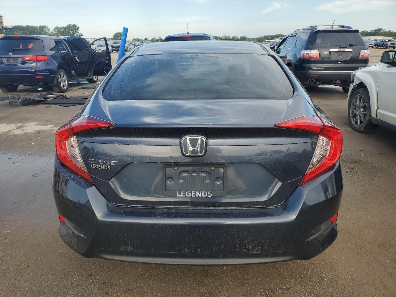 2018 Honda Civic Lx VIN: 19XFC2F58JE013765 Lot: 66997595