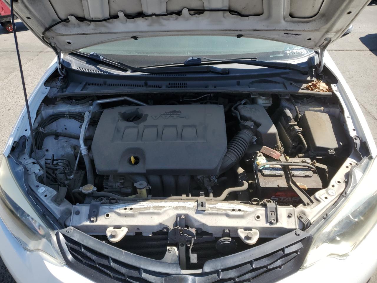 2014 Toyota Corolla L VIN: 5YFBURHE5EP058877 Lot: 64977105