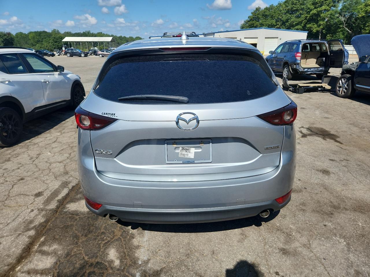 2021 Mazda Cx-5 Touring VIN: JM3KFACM6M1327330 Lot: 65927045