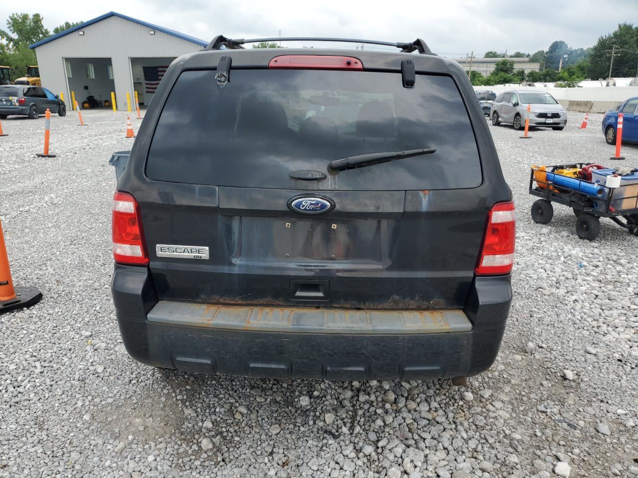 2011 Ford Escape Xlt VIN: 1FMCU0D76BKB11423 Lot: 64874445