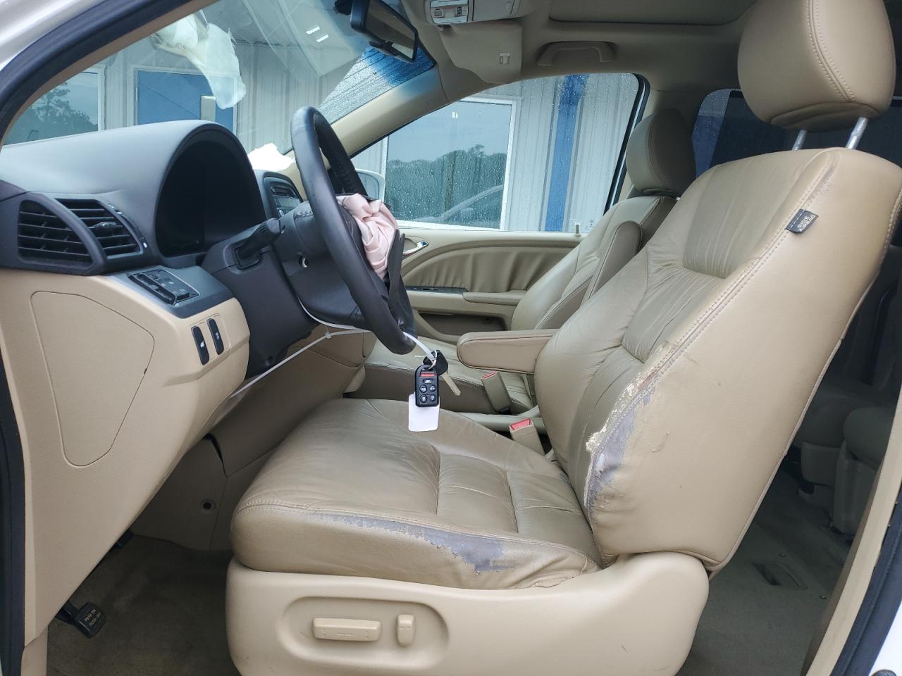 2010 Honda Odyssey Exl VIN: 5FNRL3H70AB097589 Lot: 64821215