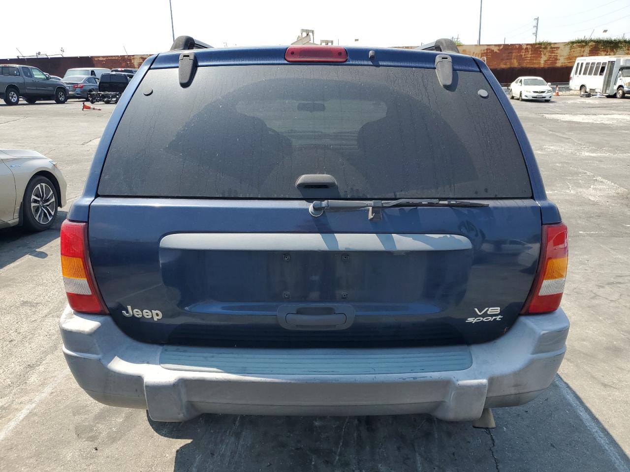 2002 Jeep Grand Cherokee Sport VIN: 1J4GX38N42C195706 Lot: 64054105