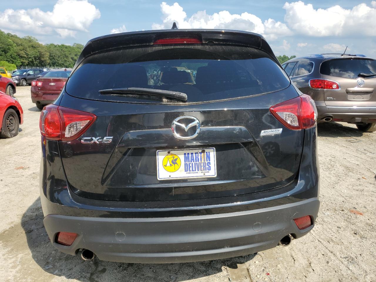 2013 Mazda Cx-5 Touring VIN: JM3KE2CE5D0105966 Lot: 63800535