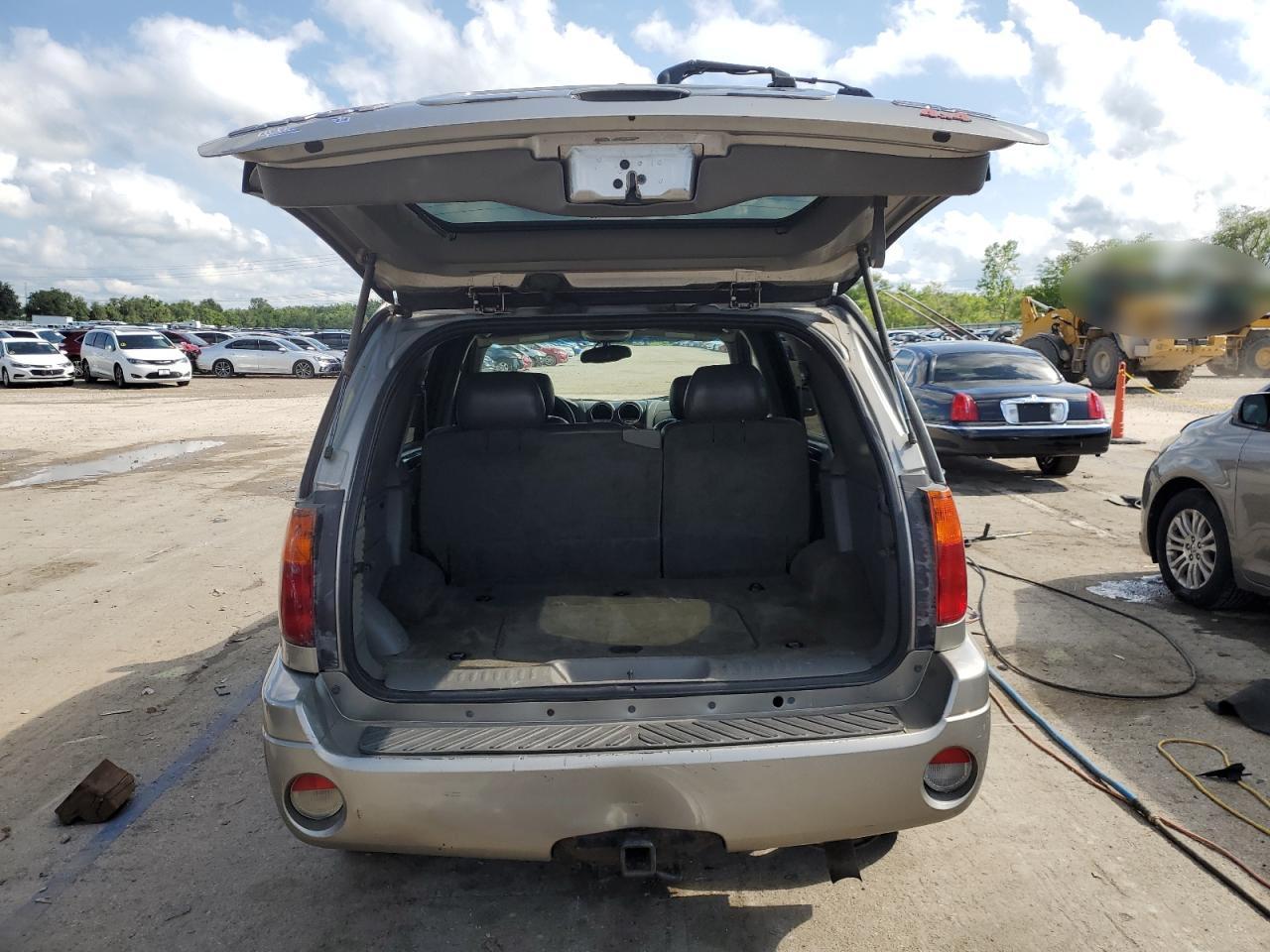 2003 GMC Envoy VIN: 1GKDT13S932242908 Lot: 65751735