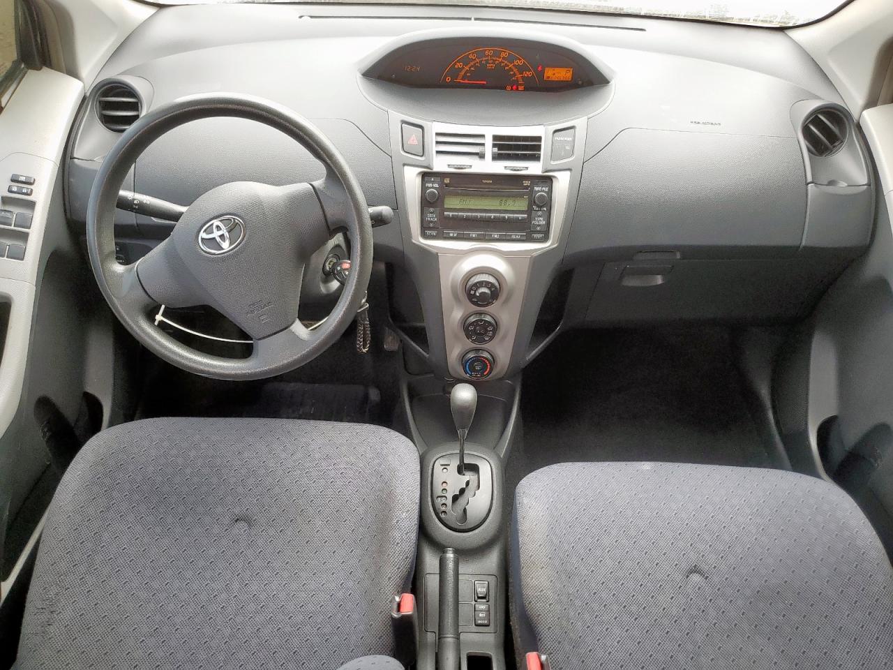 2009 Toyota Yaris VIN: JTDKT903095254936 Lot: 64861005
