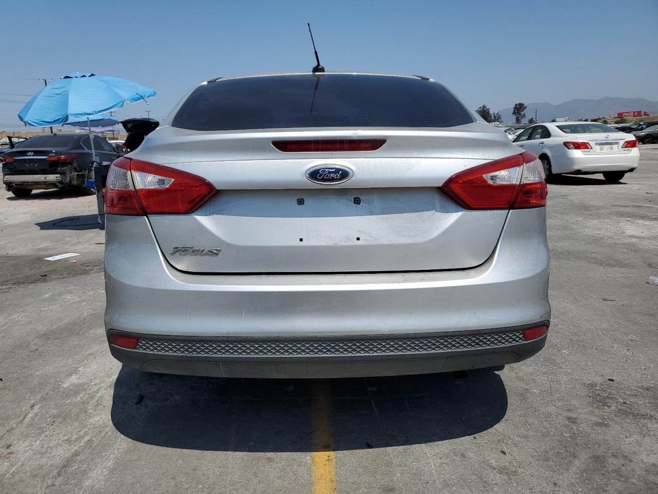 2013 Ford Focus S VIN: 1FADP3E26DL235764 Lot: 65407945