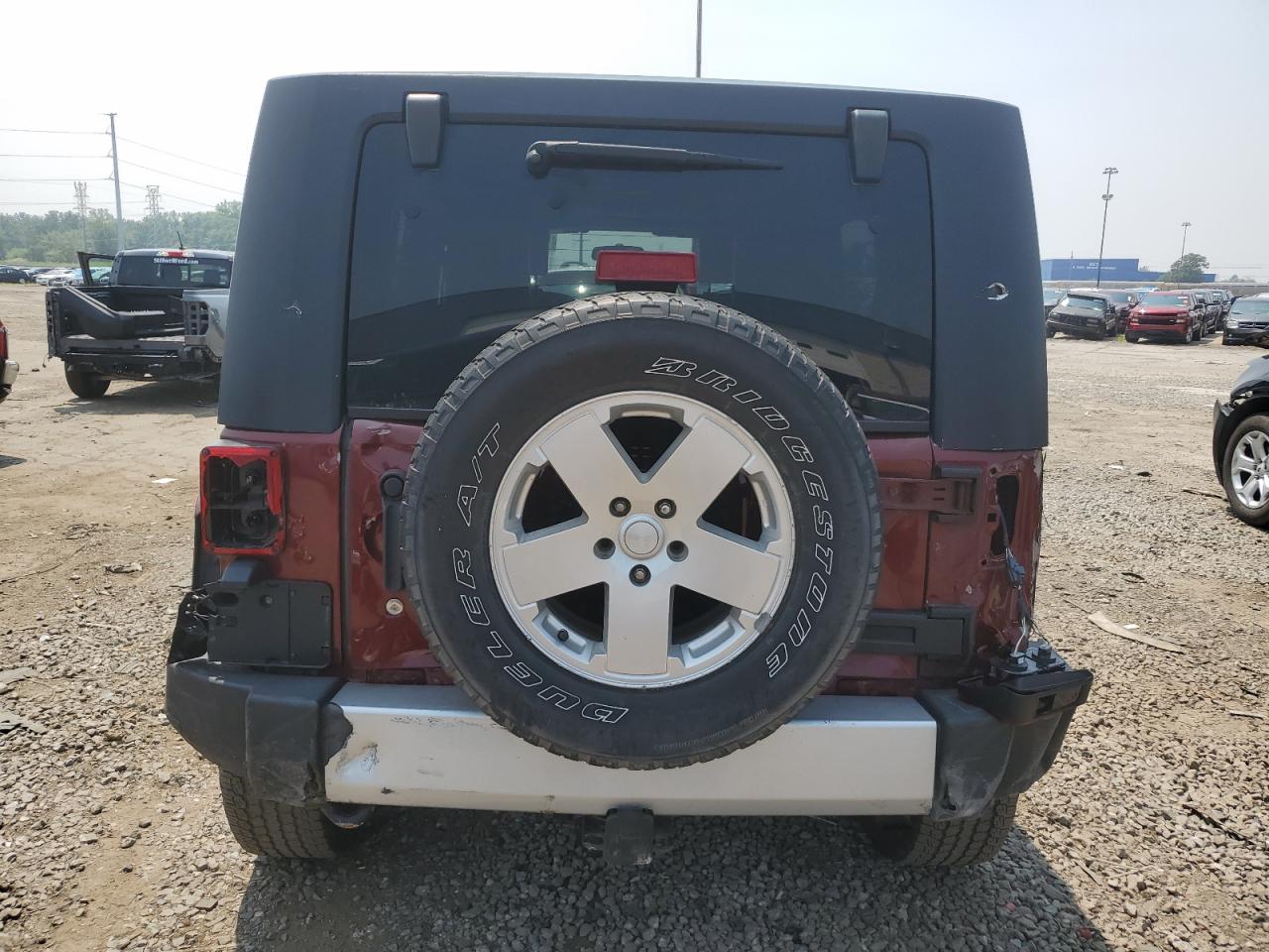 2010 Jeep Wrangler Unlimited Sahara VIN: 1J4BA5H18AL186476 Lot: 63929475