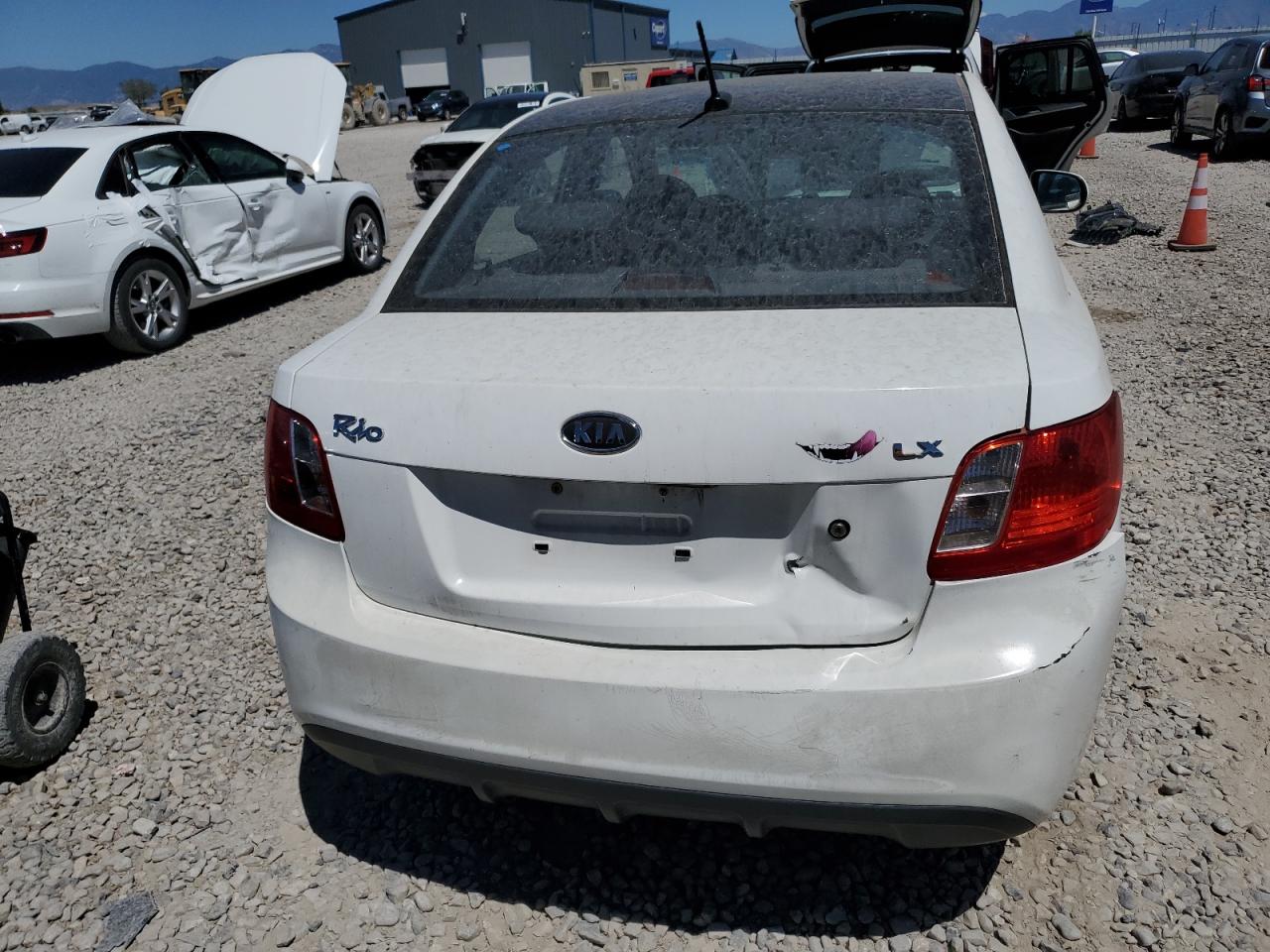2011 Kia Rio Base VIN: KNADH4A38B6721156 Lot: 63422815