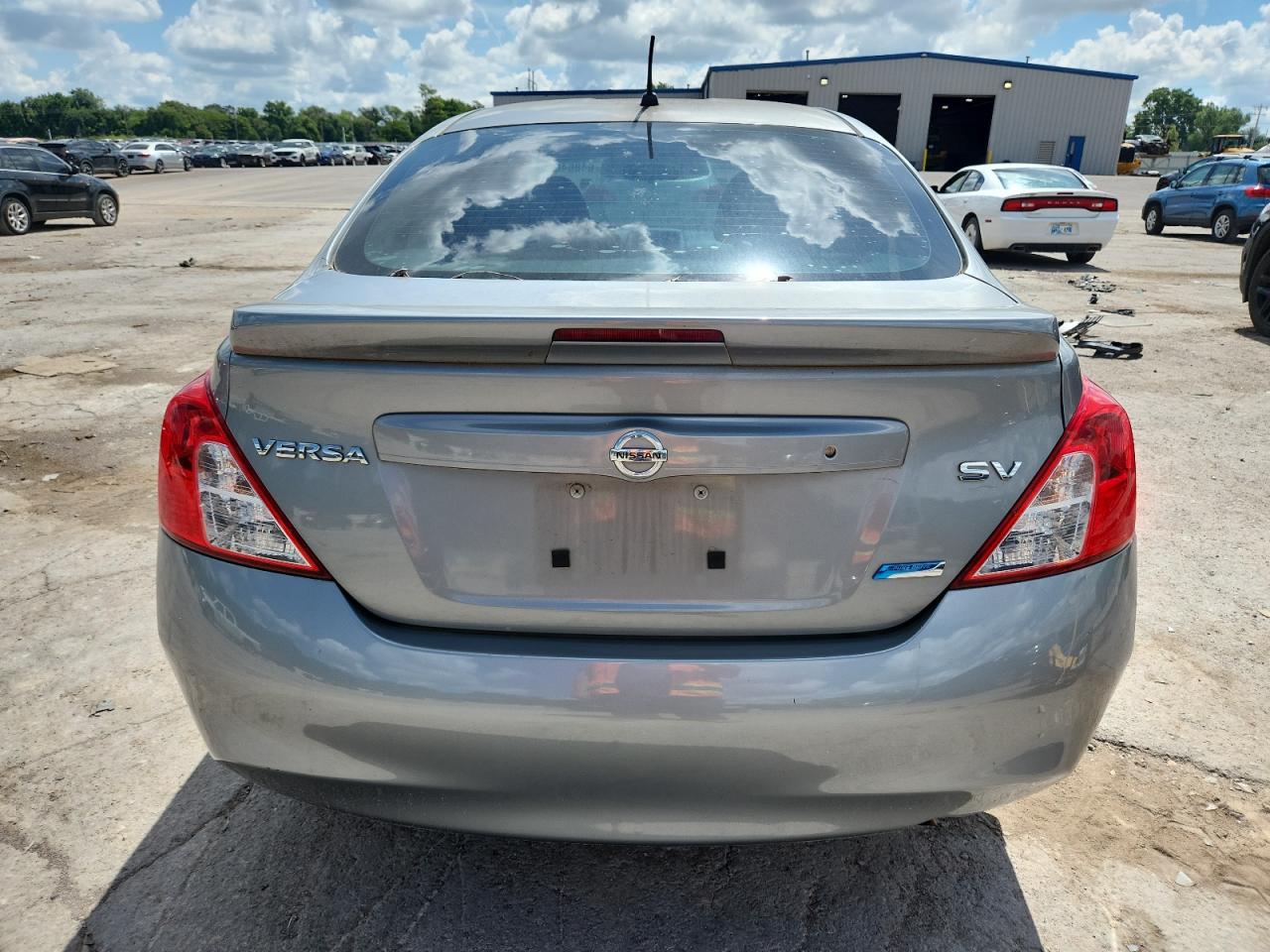 2014 Nissan Versa S VIN: 3N1CN7AP4EL833168 Lot: 64864095
