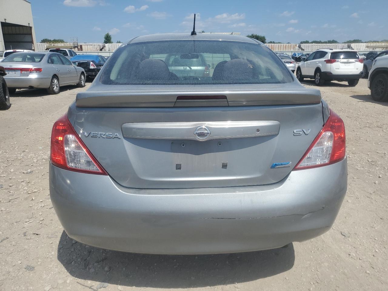 2014 Nissan Versa S VIN: 3N1CN7AP2EL801030 Lot: 64380235
