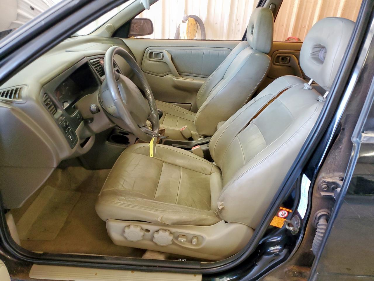 1999 Infiniti G20 VIN: JNKCP11A6XT012859 Lot: 64179555