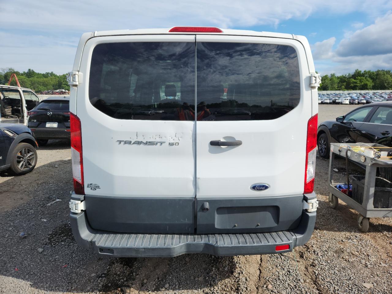 2016 Ford Transit T-150 VIN: 1FTYE1ZM8GKB33328 Lot: 65212855