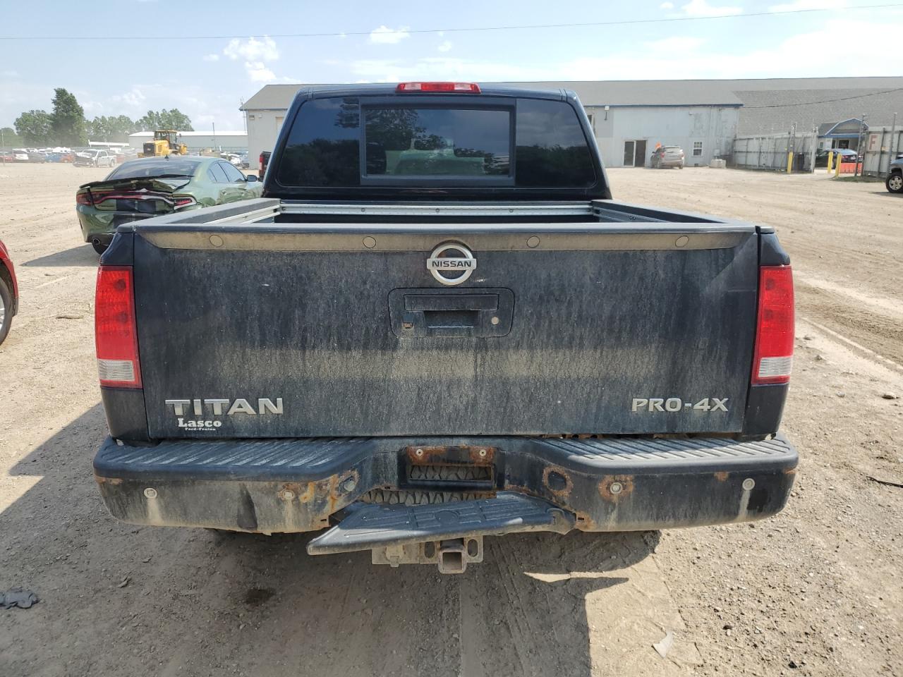 2014 Nissan Titan S VIN: 1N6AA0EC8EN517557 Lot: 62281975