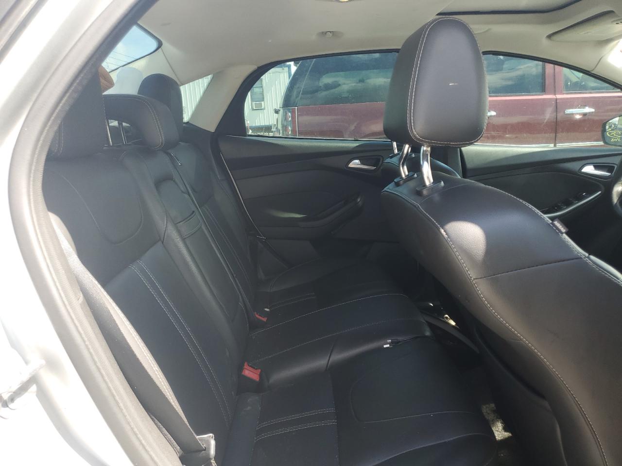 2012 Ford Focus Titanium VIN: 1FAHP3J25CL213938 Lot: 65078405