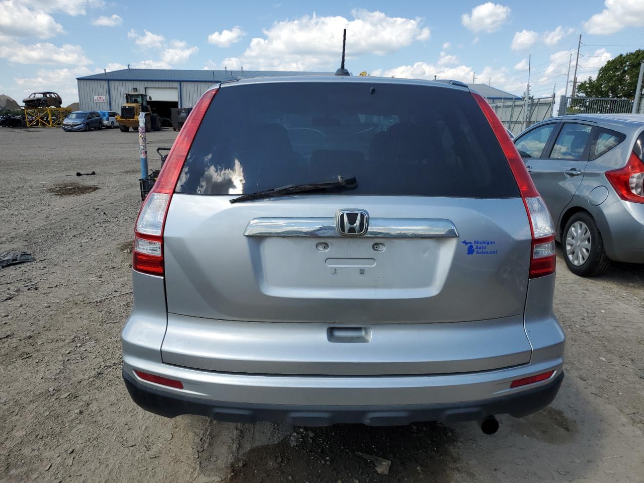 2011 Honda Cr-V Exl VIN: JHLRE4H77BC009851 Lot: 62988255