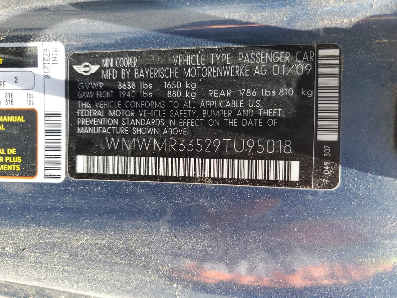 2009 Mini Cooper VIN: WMWMR33529TU95018 Lot: 64123485