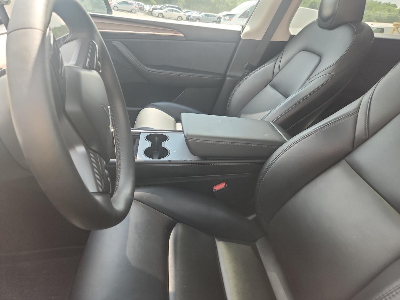 2023 Tesla Model Y VIN: 7SAYGAEE1PF805187 Lot: 64829605