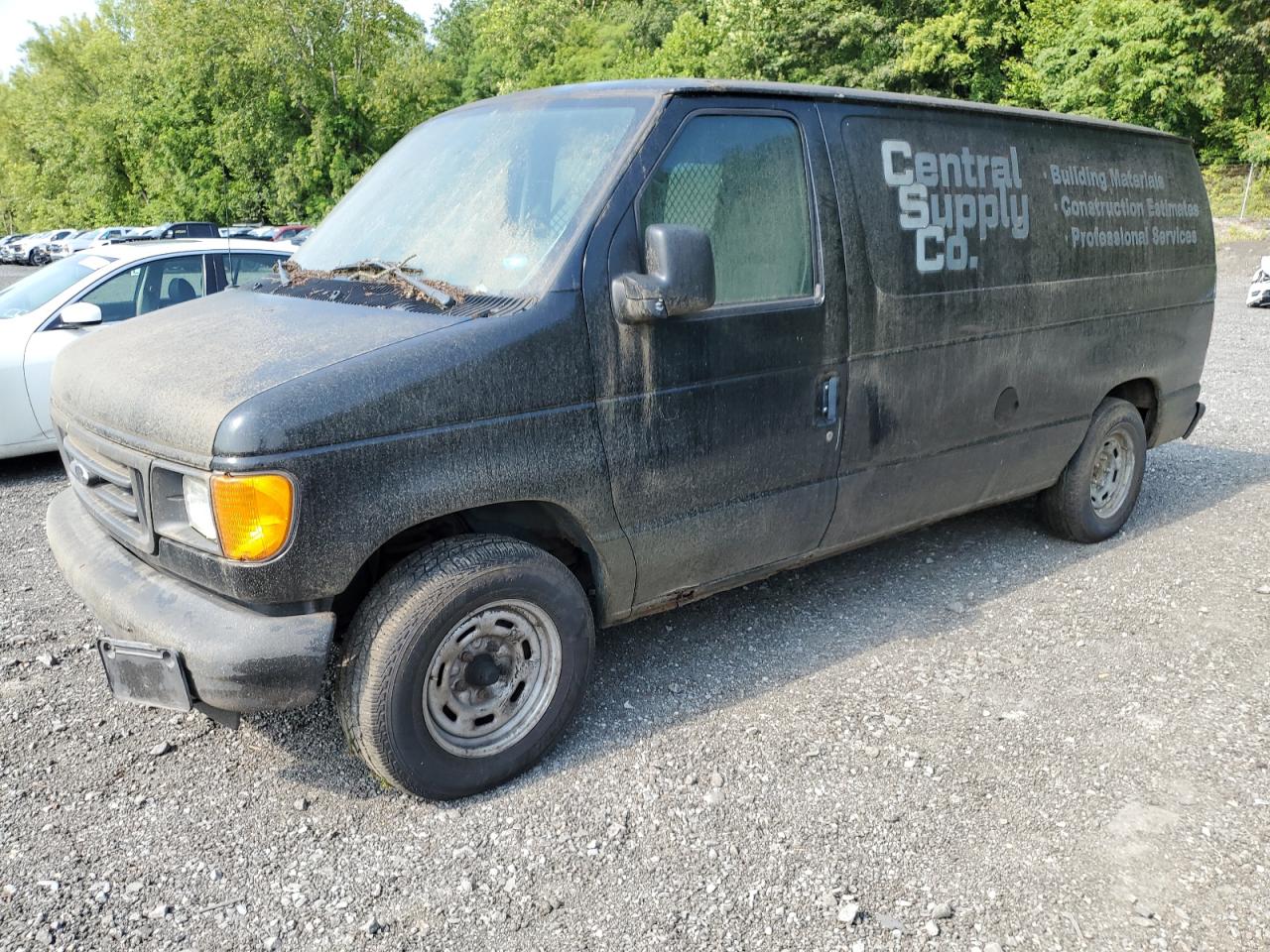 2004 Ford Econoline E150 Van black van gas 1FTRE14W14HA41659 photo #1