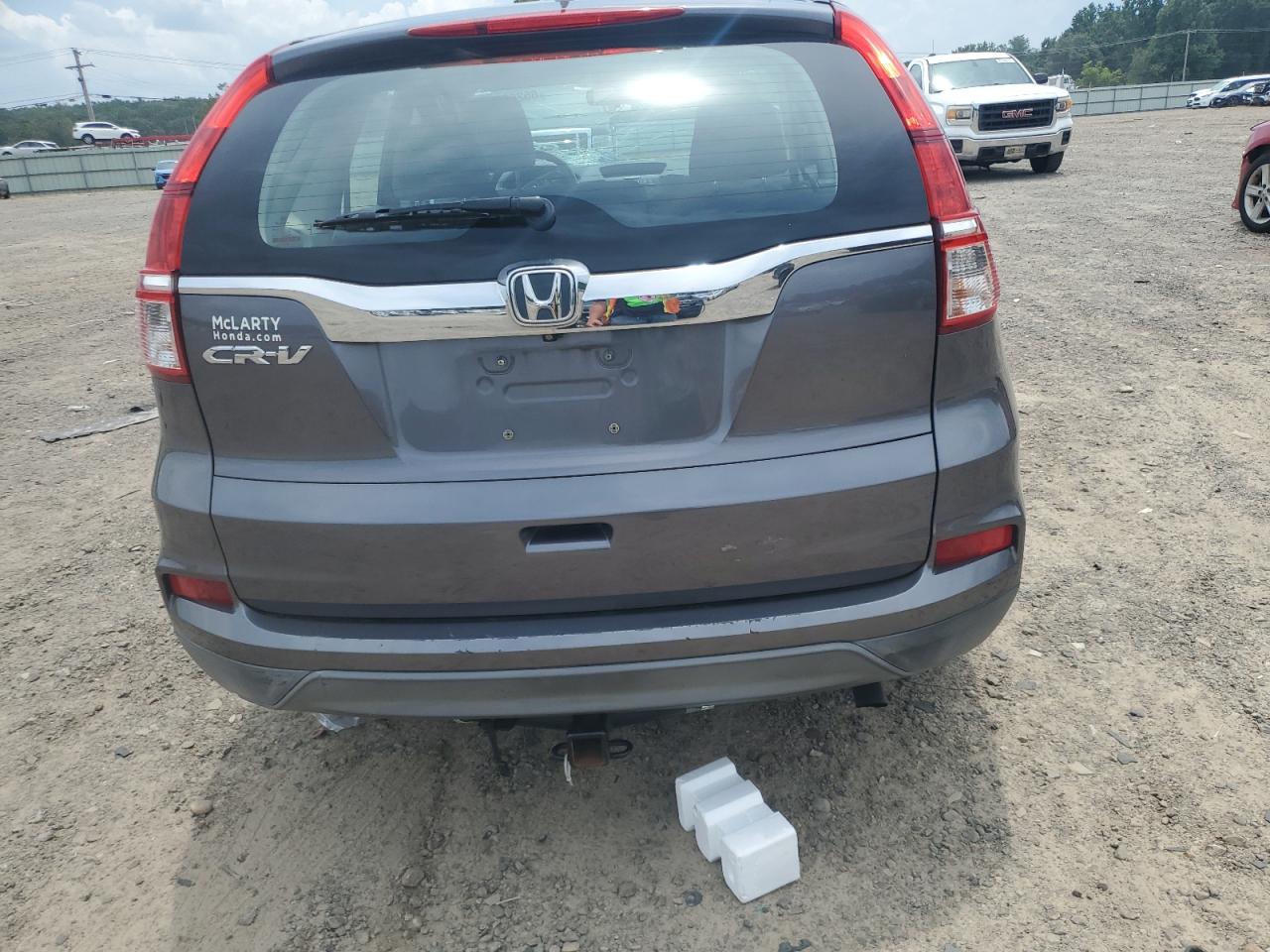 2015 Honda Cr-V Lx VIN: 2HKRM3H34FH504719 Lot: 65269985