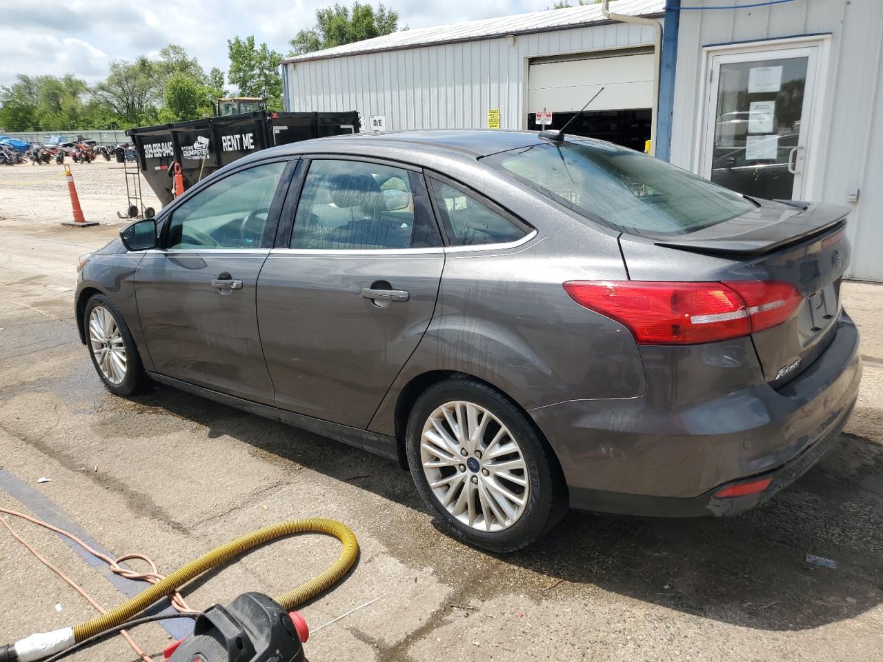 2015 Ford Focus Titanium VIN: 1FADP3J29FL293280 Lot: 65243455