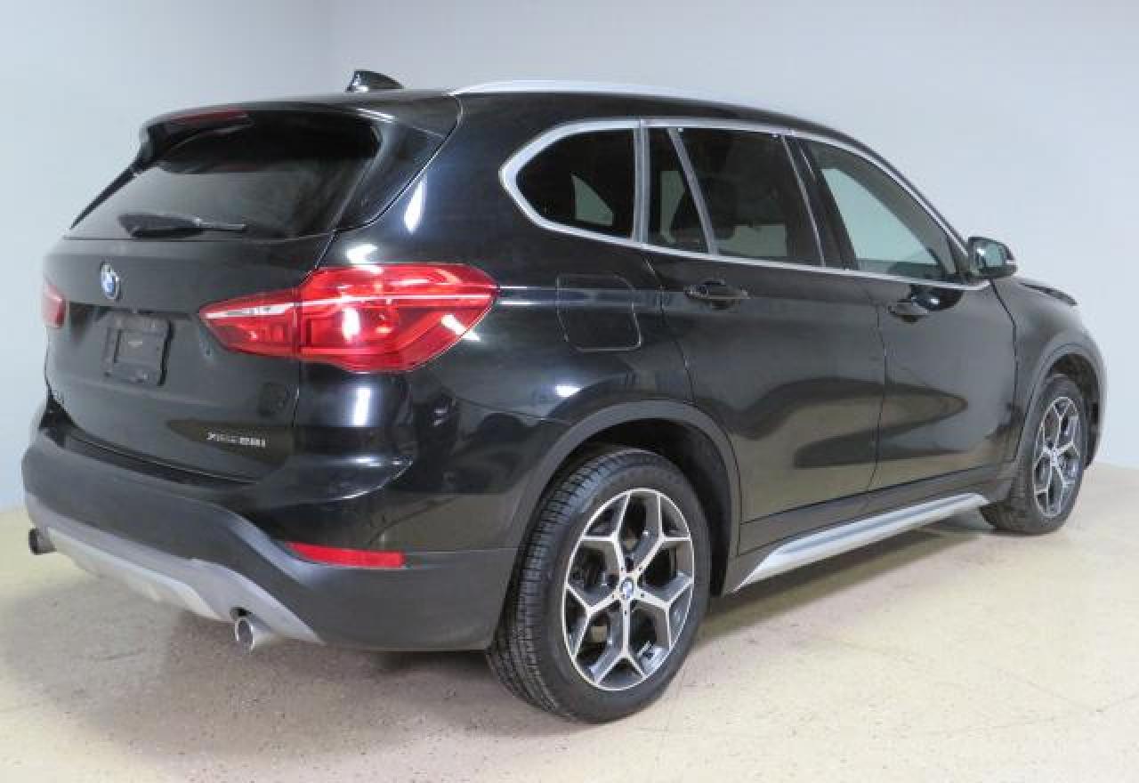 2018 BMW X1 xDrive28I VIN: WBXHT3C35J5L33173 Lot: 66192495