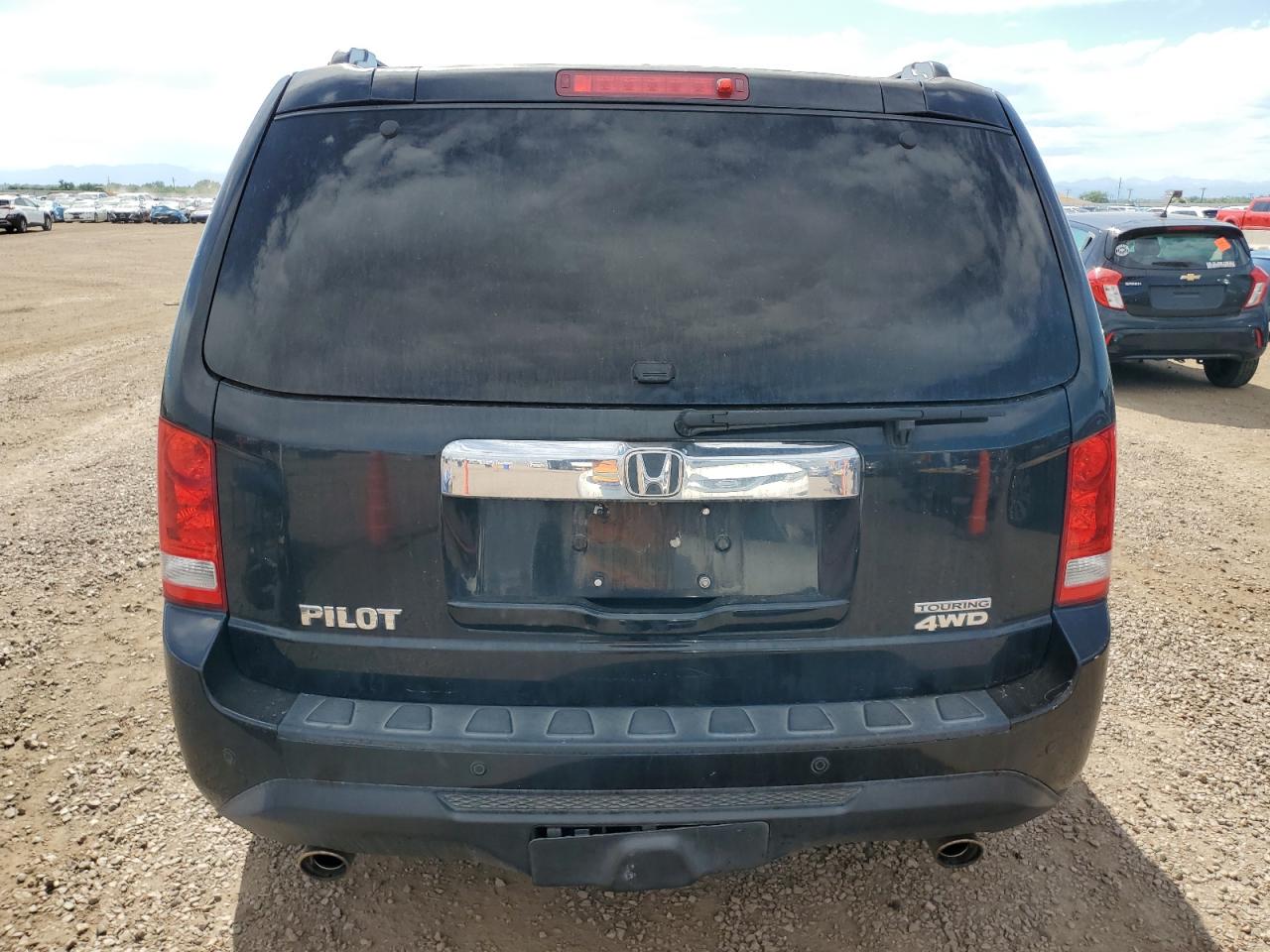 2012 Honda Pilot Touring VIN: 5FNYF4H97CB052534 Lot: 63121495