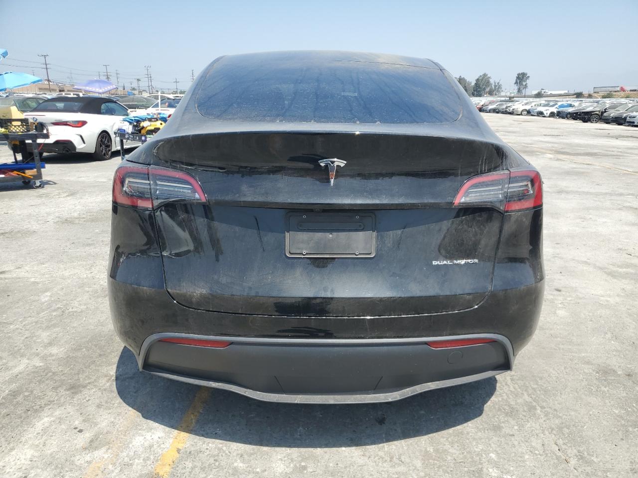 2023 Tesla Model Y VIN: 7SAYGAEE6PF796339 Lot: 63155255