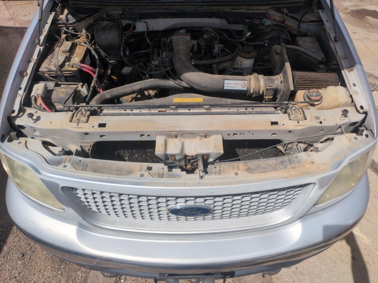 1999 Ford F150 VIN: 1FTRX18L7XKA53963 Lot: 66189025