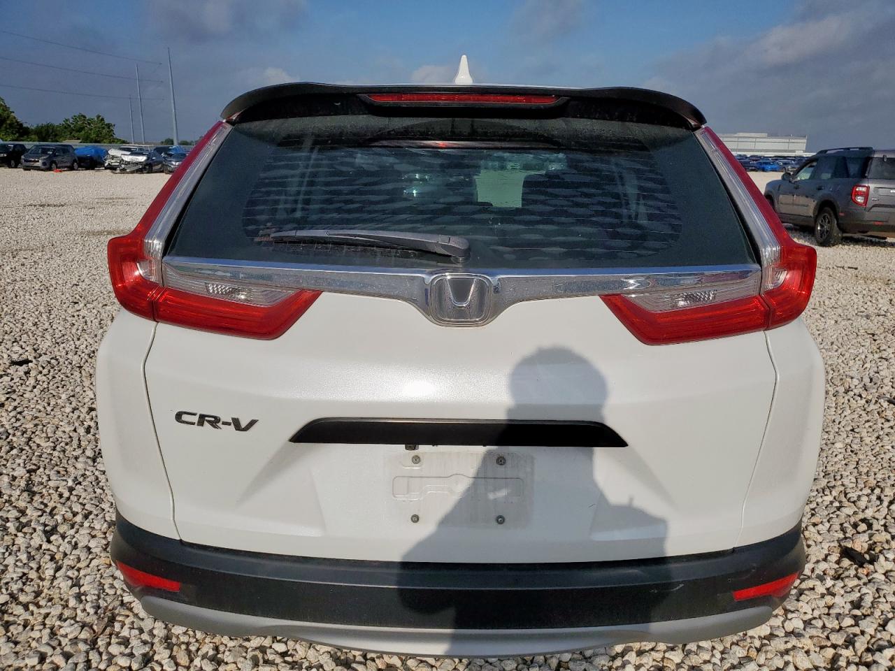 2019 Honda Cr-V Lx VIN: 2HKRW5H33KH404465 Lot: 64181215