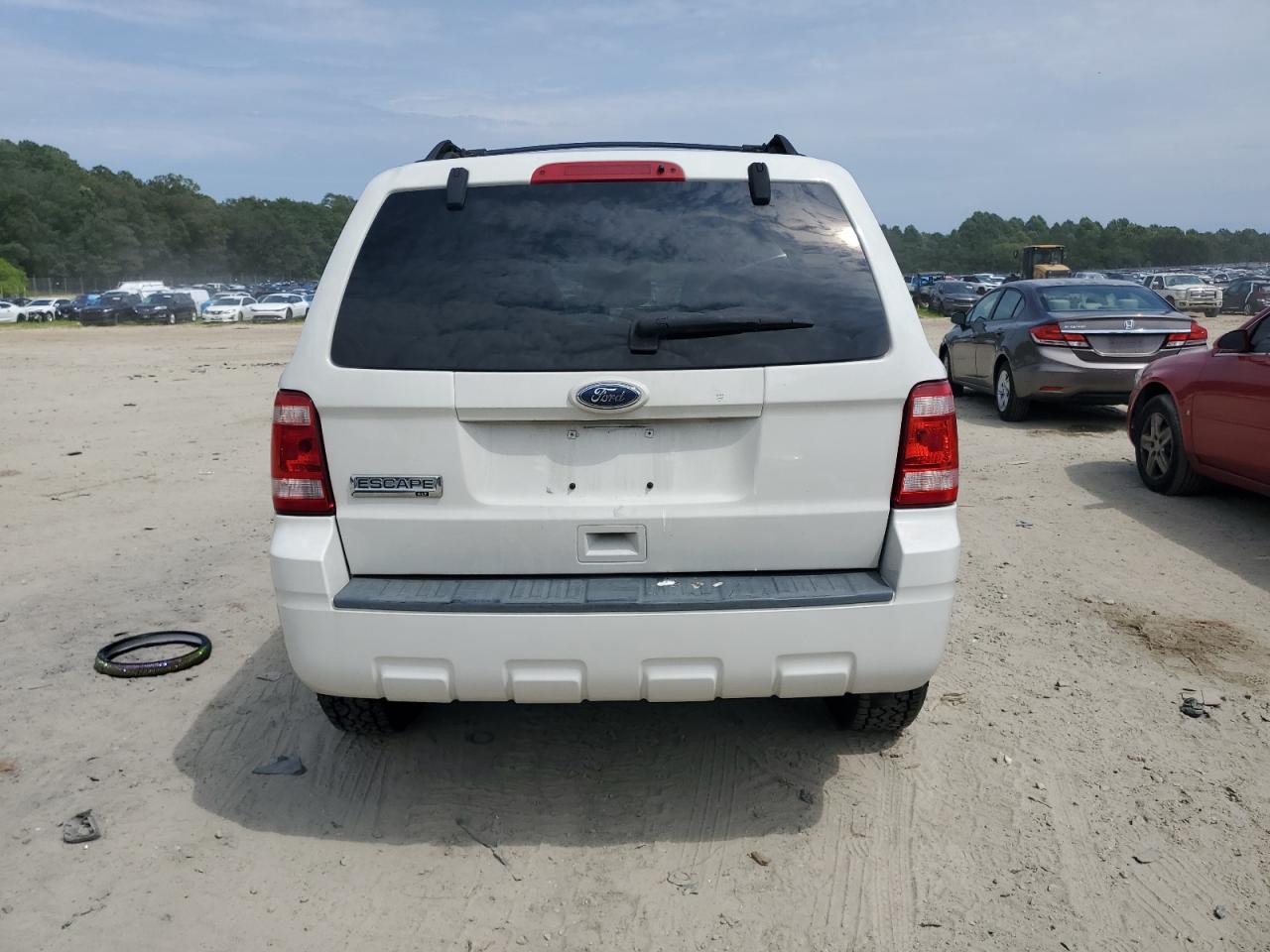 2010 Ford Escape Xlt VIN: 1FMCU9D73AKC75991 Lot: 65012175