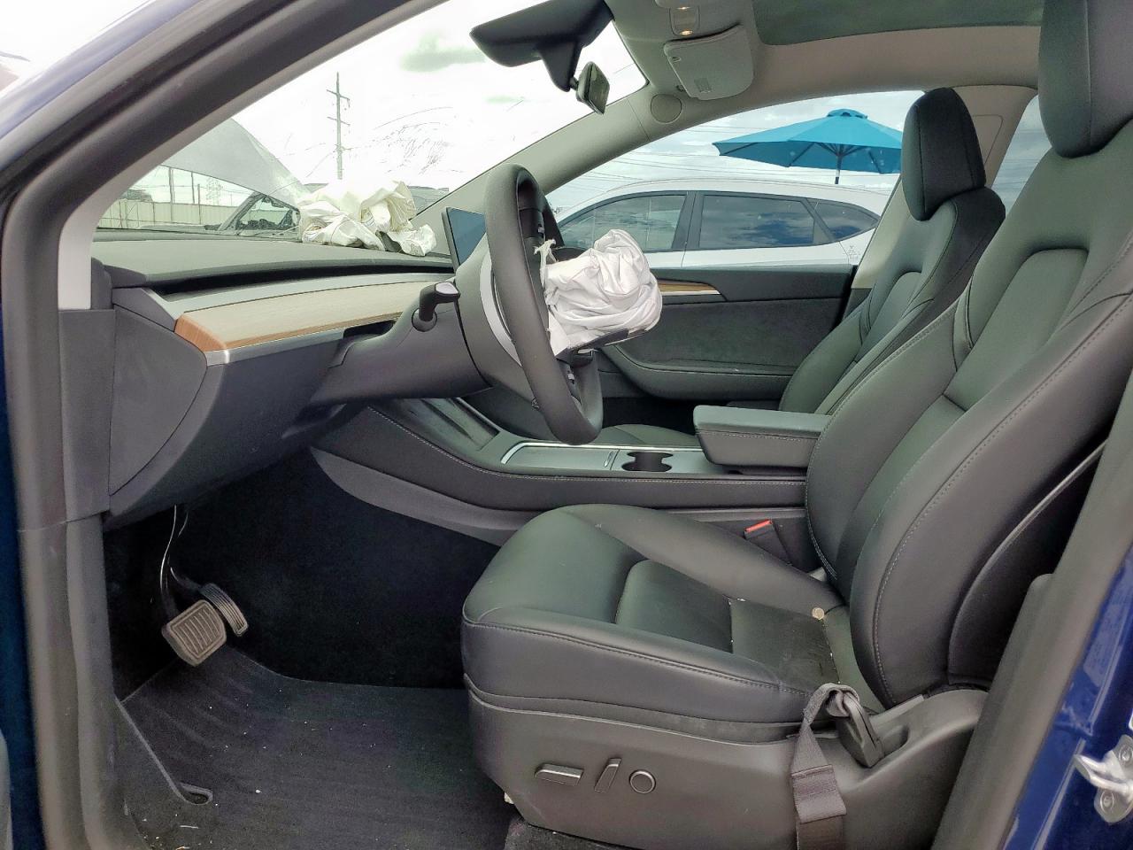 2023 Tesla Model Y VIN: 7SAYGDEE3PA167684 Lot: 63126885