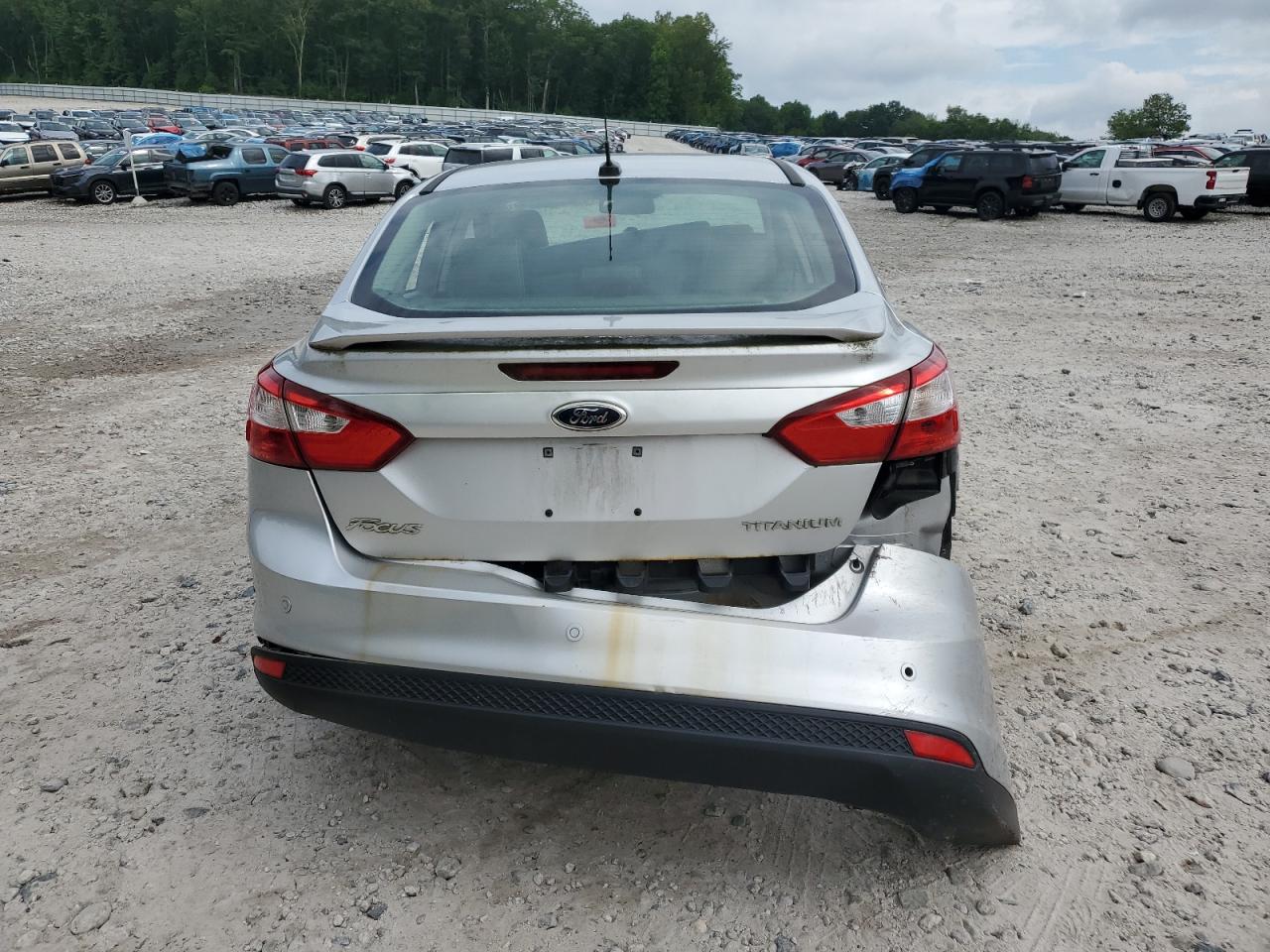 2012 Ford Focus Titanium VIN: 1FAHP3J20CL287090 Lot: 64443385