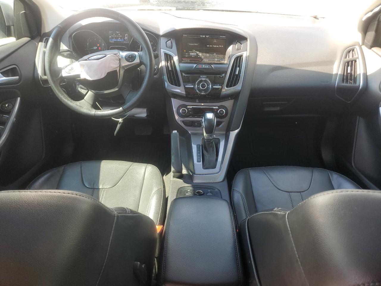 2014 Ford Focus Titanium VIN: 1FADP3N27EL409889 Lot: 63164225