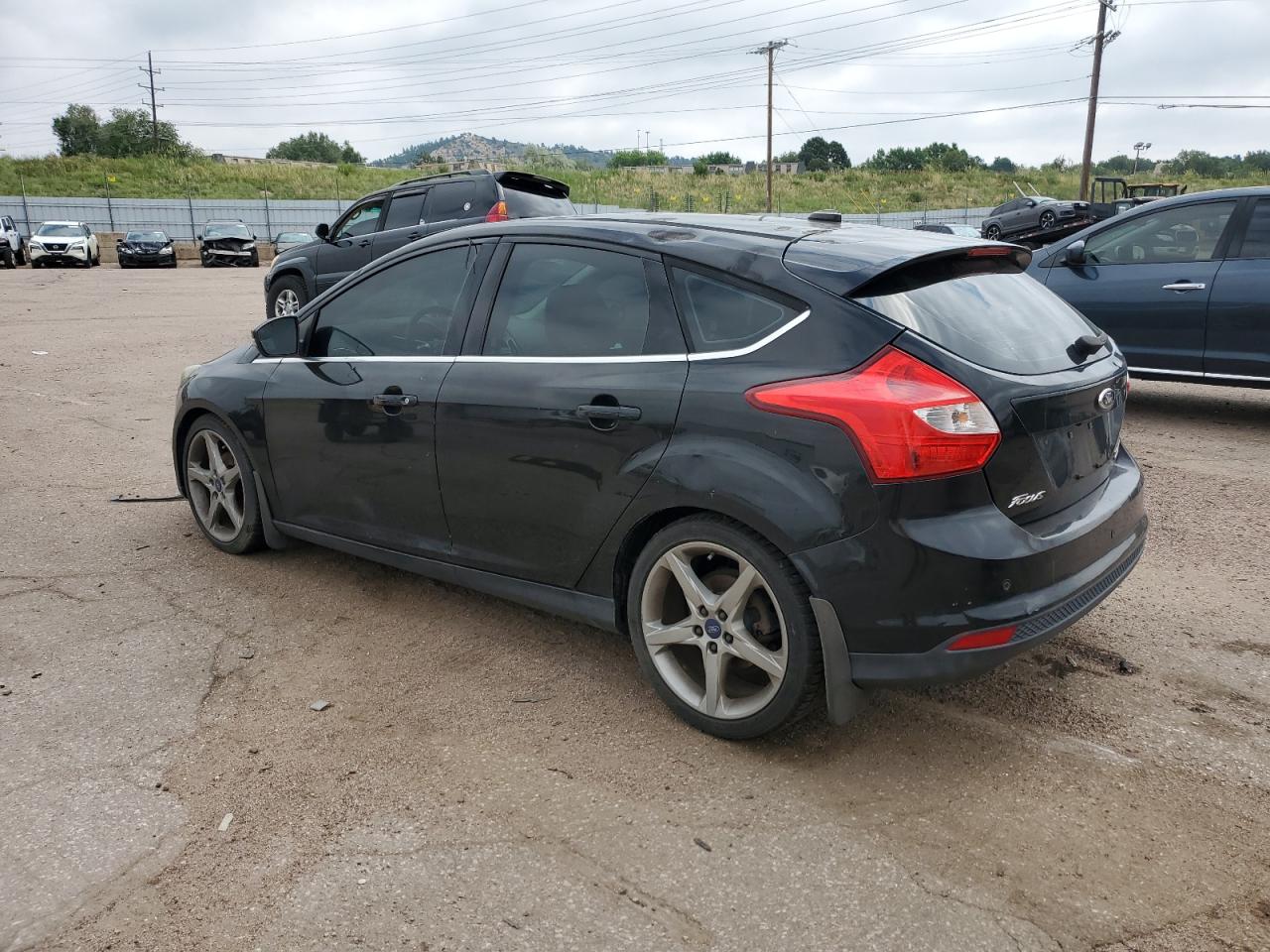 2014 Ford Focus Titanium VIN: 1FADP3N29EL396398 Lot: 65085785