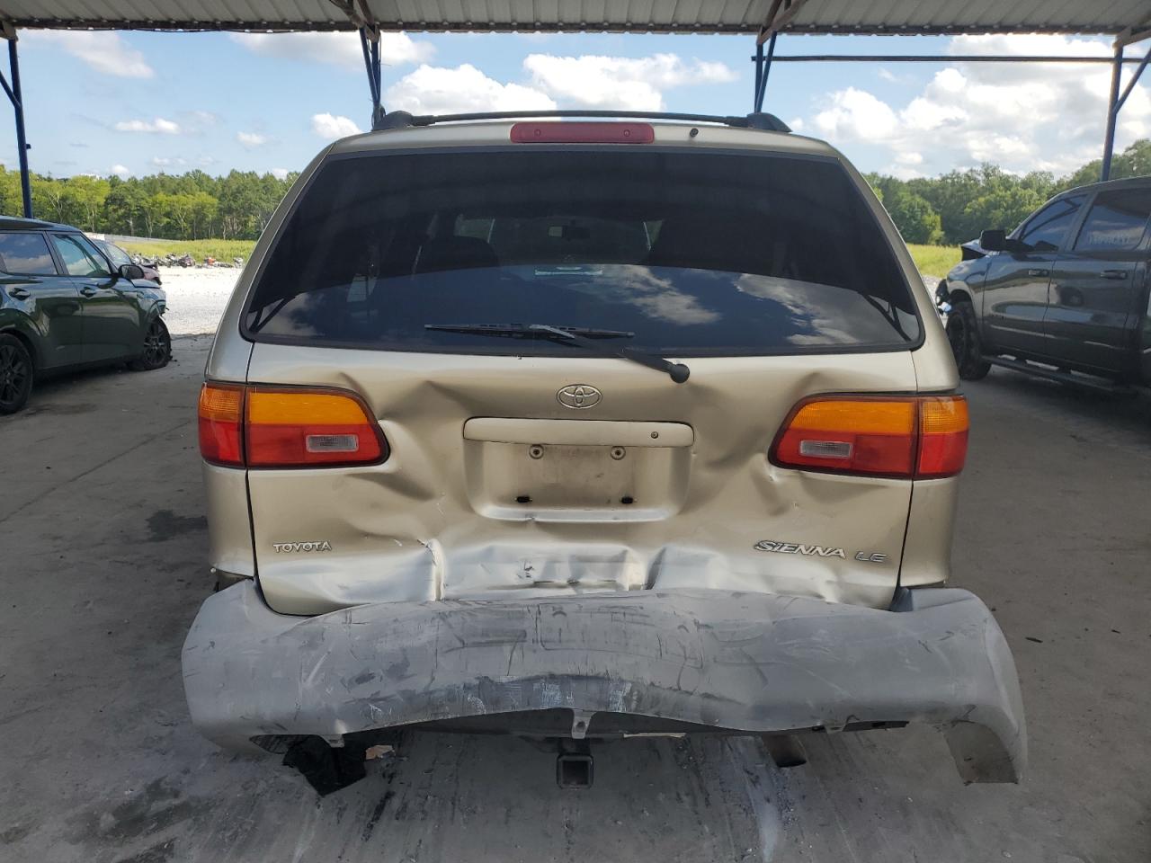 2000 Toyota Sienna Le VIN: 4T3ZF13C9YU202523 Lot: 65237415