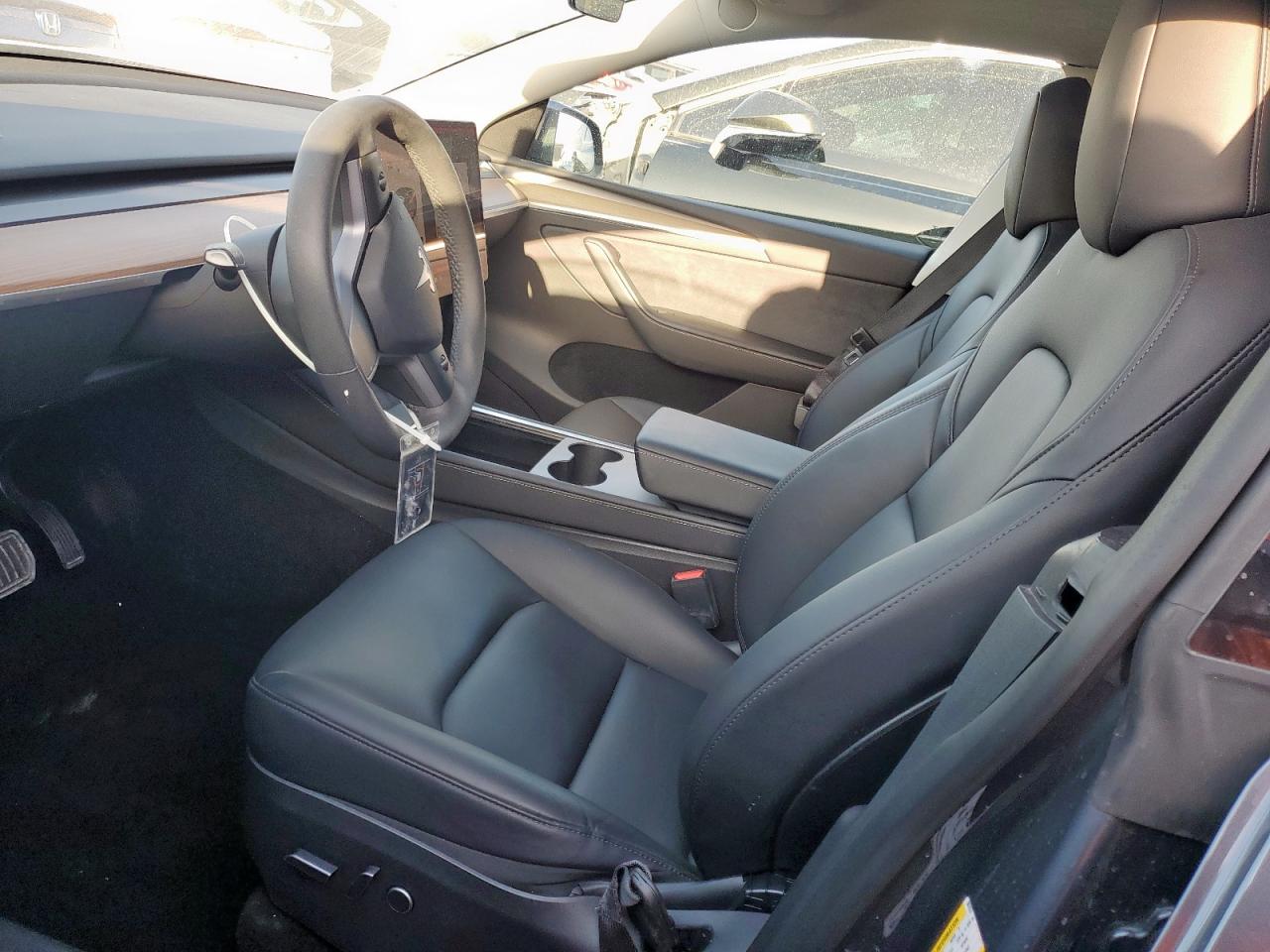 2023 Tesla Model Y VIN: 7SAYGDEE2PA087874 Lot: 66696225