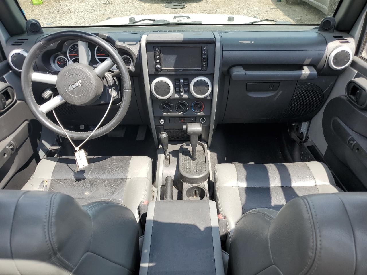 2010 Jeep Wrangler Unlimited Sahara VIN: 1J4HA5H18AL180445 Lot: 64086195