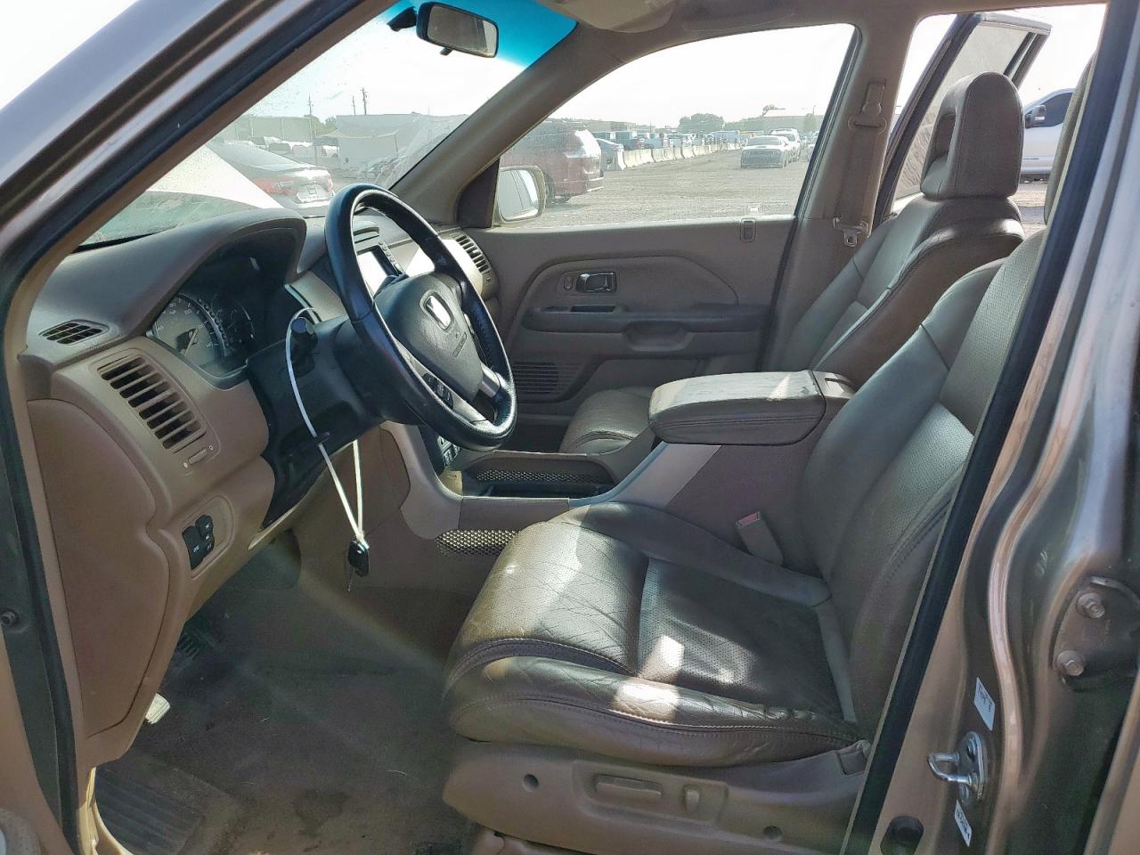 2004 Honda Pilot Exl VIN: 2HKYF18704H562661 Lot: 62838525