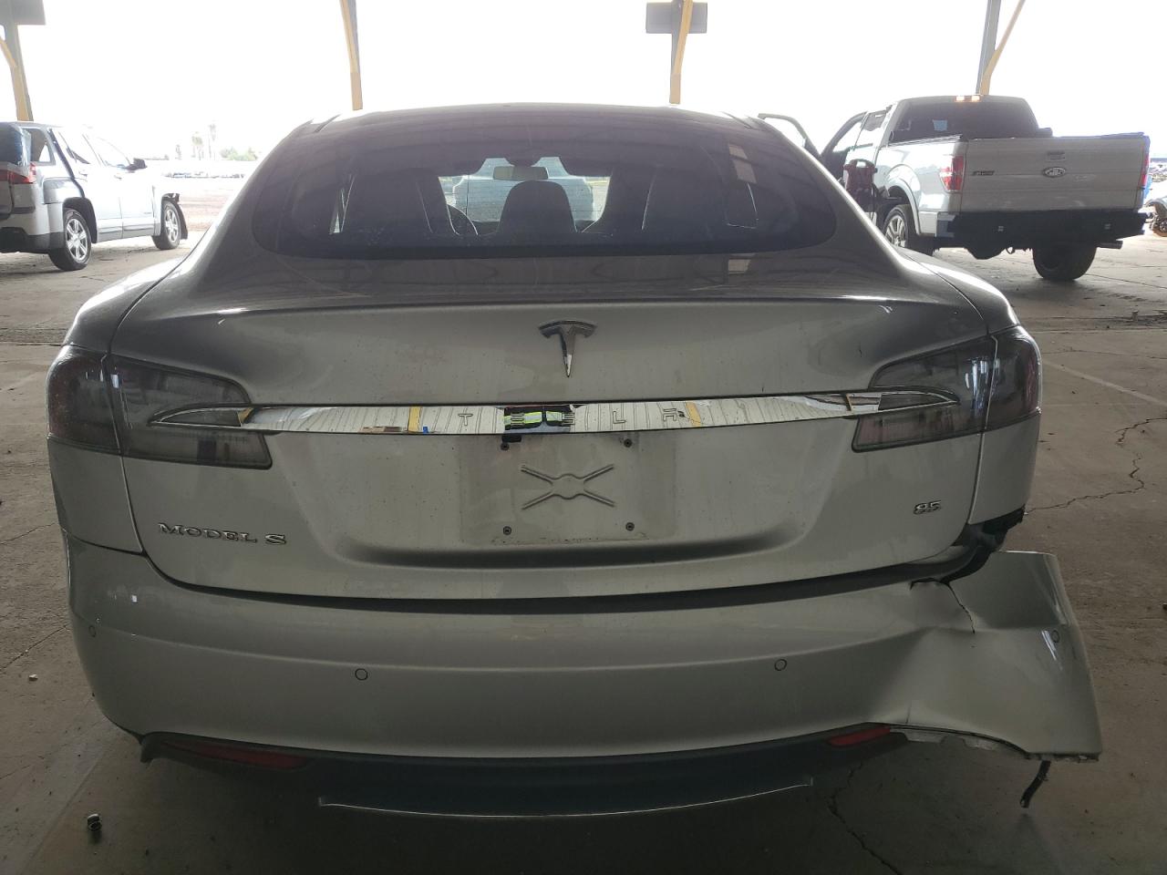 2014 Tesla Model S VIN: 5YJSA1H19EFP61319 Lot: 64798375