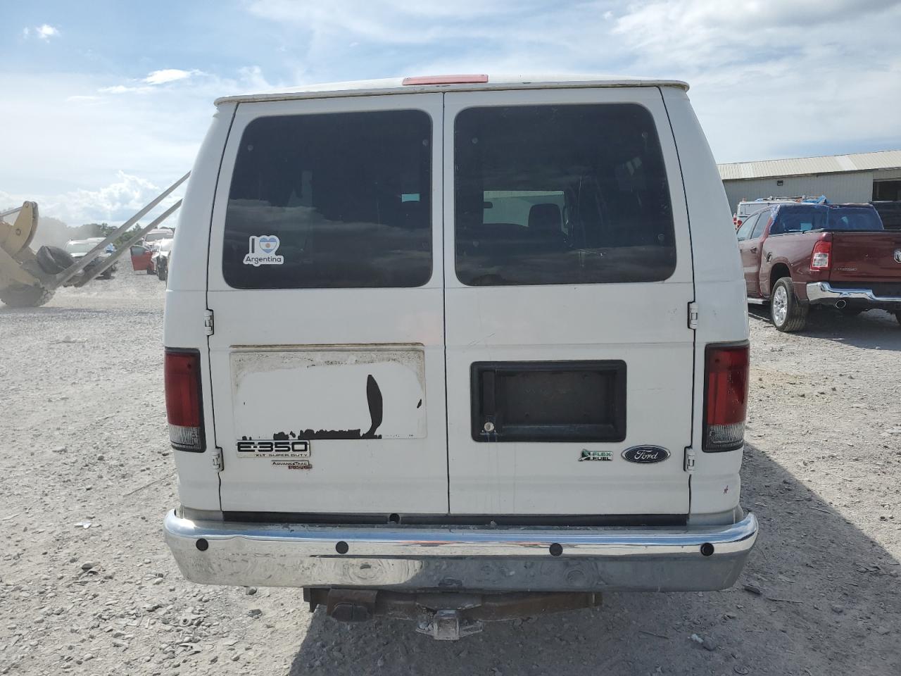 2009 Ford Econoline E350 Super Duty Wagon VIN: 1FBSS31LX9DA71035 Lot: 65399725