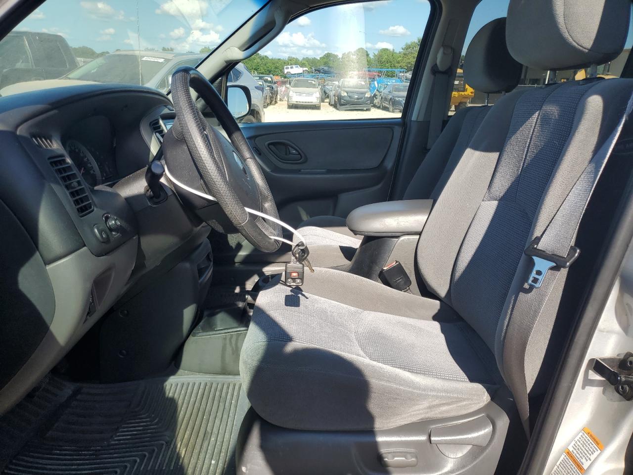 2004 Mazda Tribute Lx VIN: 4F2CZ94144KM33874 Lot: 65461715