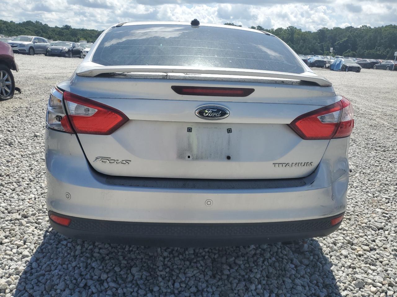 2012 Ford Focus Titanium VIN: 1FAHP3J25CL213938 Lot: 65078405