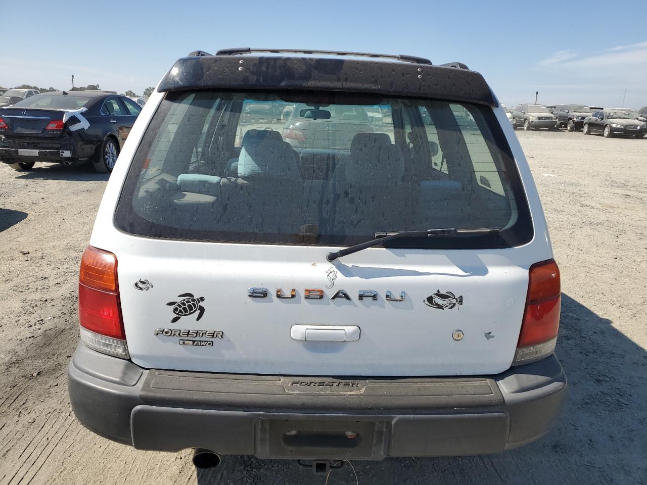 1999 Subaru Forester L VIN: JF1SF6354XH701045 Lot: 63166605